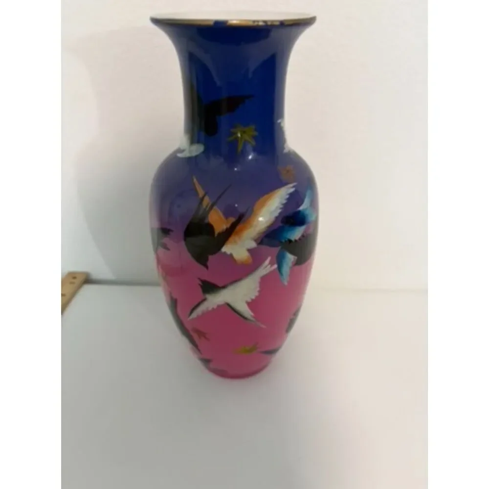 japanese vase with dark blue and pink ground, featuring birds